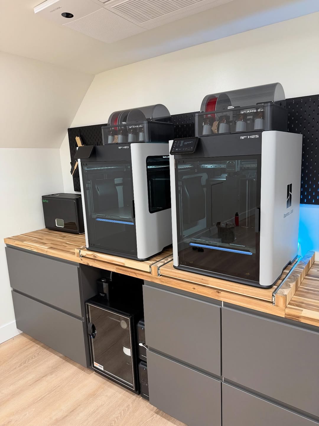 Bambu Lab printer farm producing small-batch parts